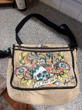 Women’s Mark Ecko Canvas Y2K Skull Floral Artwork Messenger Bag